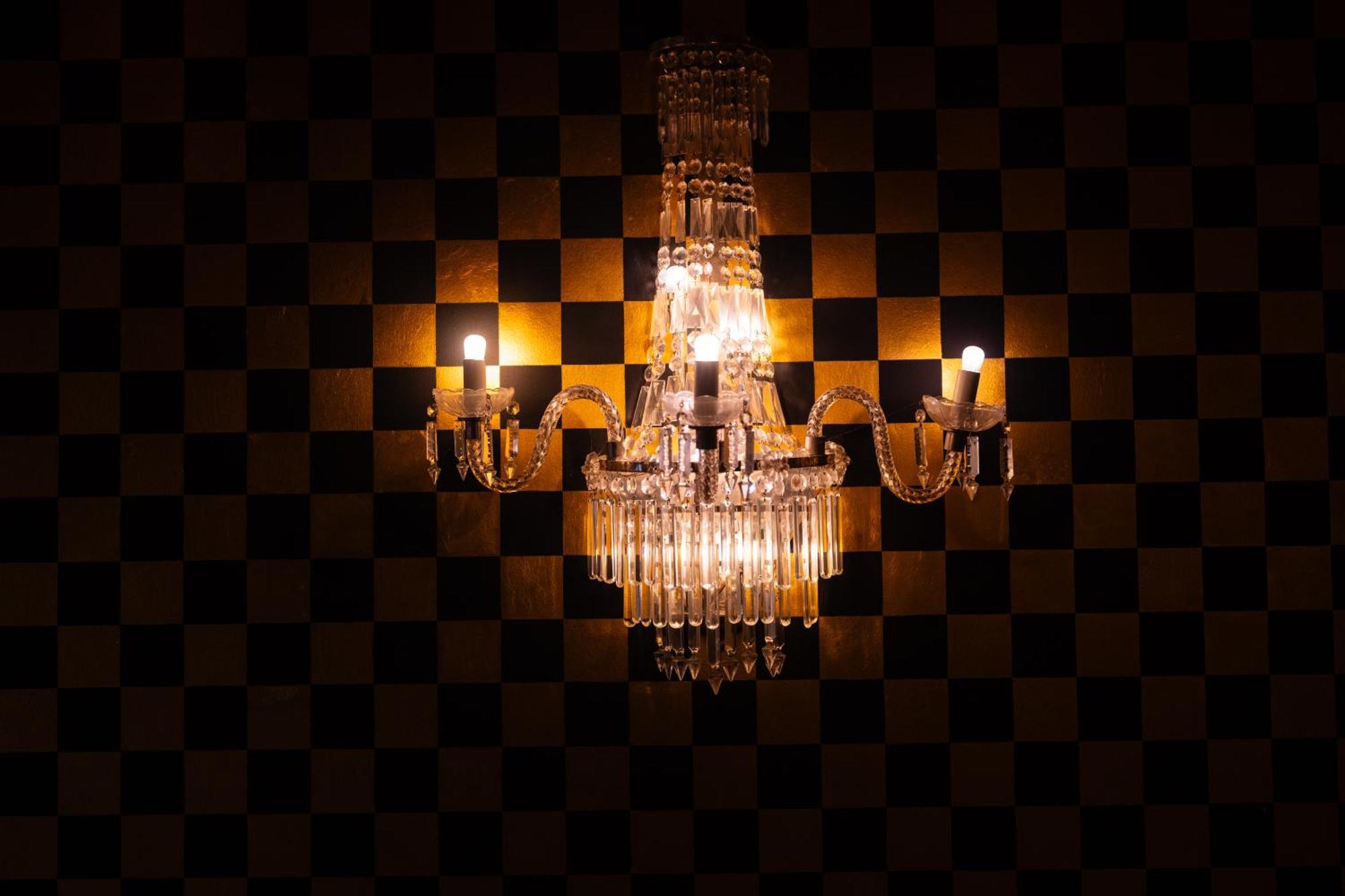 Crazy Bear Beaconsfield Hotel Exterior photo A wall-mounted chandelier